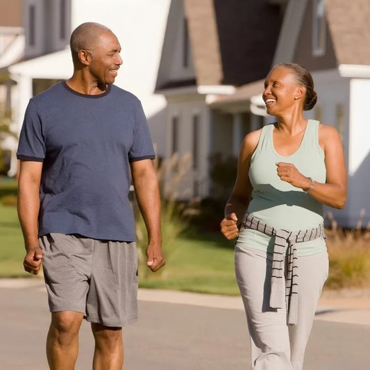 Two-middle-aged-couples-taking-a-walk-after-dinner